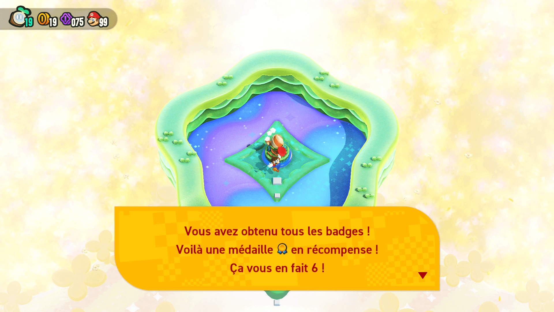 Capture d'écran de 'Super Mario Bros. Wonder' : le joueur vient de récupérer la médaille obtenue lorsque tous les badges sont récupérés.